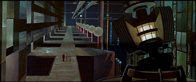 Forbidden Planet - Spaceship crew and Dr. Morbius walk around the Krell machine.